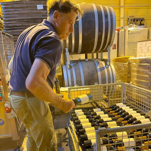 Hans in winery bottling Grandezza
