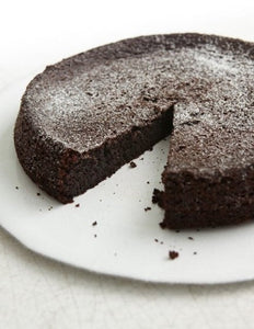 Chocolate cake before decoration placed.